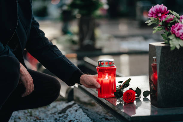 istock Man in the cemetery 1438636375