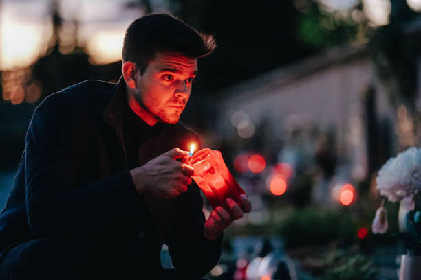 istock Man in the cemetery 1438636654