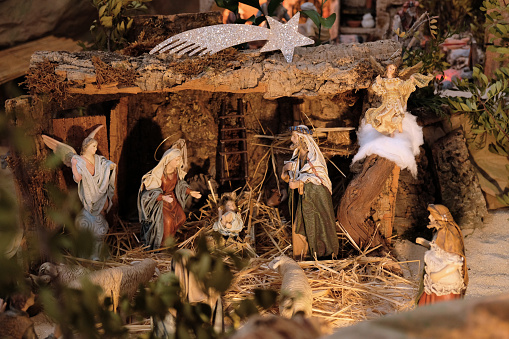 Malaga, Spain - January, 2022. Nativity scene with baby Jesus. The Magi in the nativity scene. Christian tradition has it that Three Kings visited Jesus.