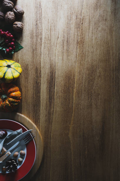 istock Thanksgiving pumpkins with fruits and falling leaves 1438642698