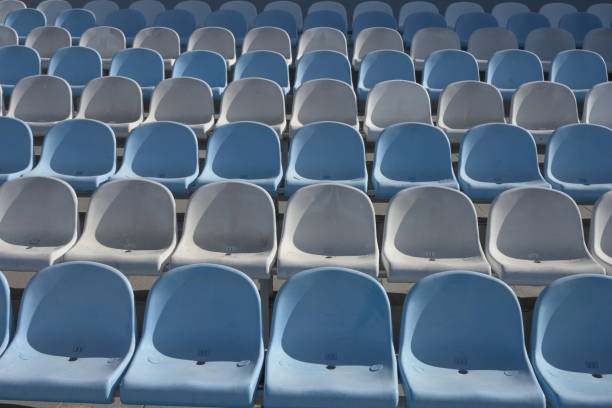 istock Empty blue and white seats of a summer sports facility 1438649721
