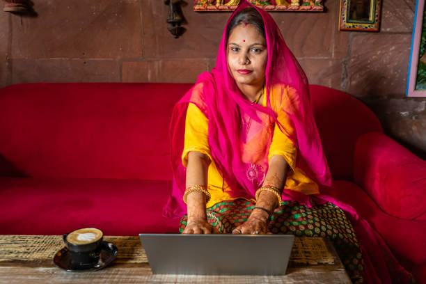 istock Young Indian woman using laptop, Jodhpur, India 1438650145