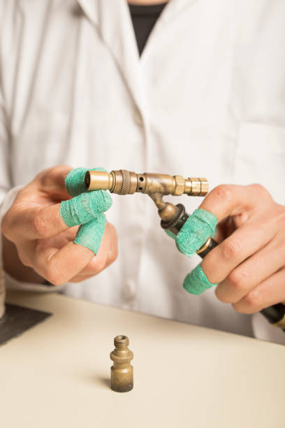 istock person uses a melting torch. vertical photo 1438653428