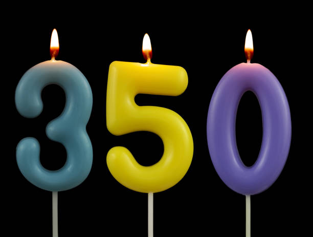 istock Birthday candles isolated on black, number 350 1438657429