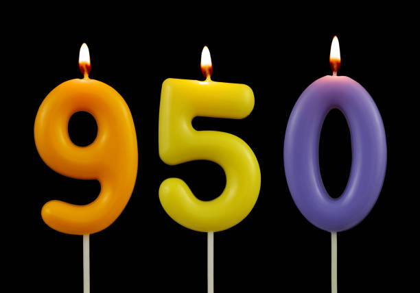 istock Birthday candles isolated on black, number 950 1438657541