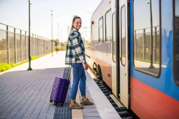 istock Woman enters the train 1438659818