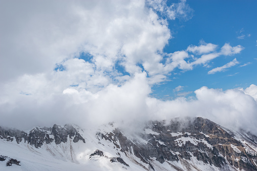 Clouds above the mountain ridge. Caucasus.