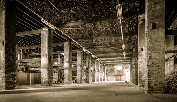 istock Inside of an old abandoned former industrial stone building 1438662641