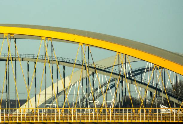 istock Modern bridge with yellow and grey metal fragments 1438662647