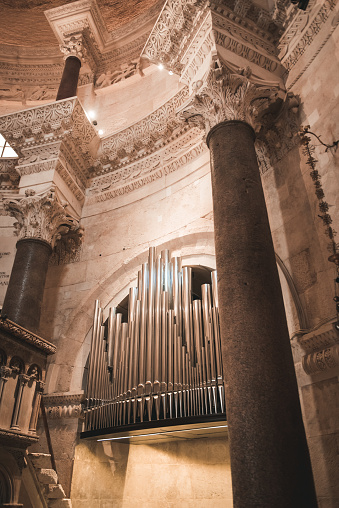 Split: Cathedral of St. Domnius. Detail of the organ pipes located between two columns. Interior view of the Cathedral which is located inside the mausoleum of Emperor Diocletian.