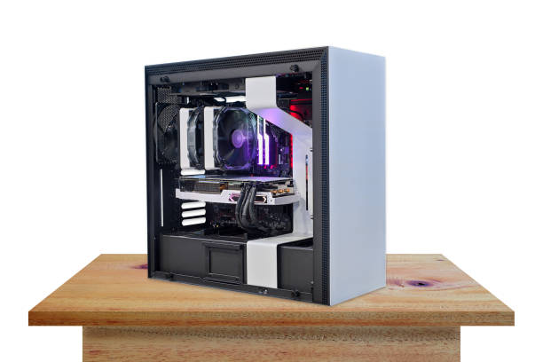istock Hi-performance custom computer desktop open from beside on working put on vintage wooden table top 1438672656