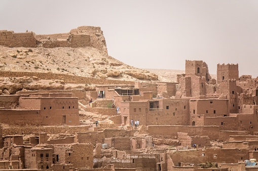 A closeup shot of buildings made of concrete under the sun in Morocco