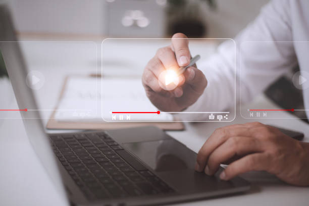 istock man using mouse and keyboard for streaming online, watching video on internet, live concert, show or tutorial 1438674757