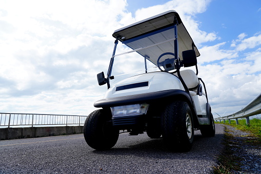 Golf cart on golf course is beautiful fairway and layout