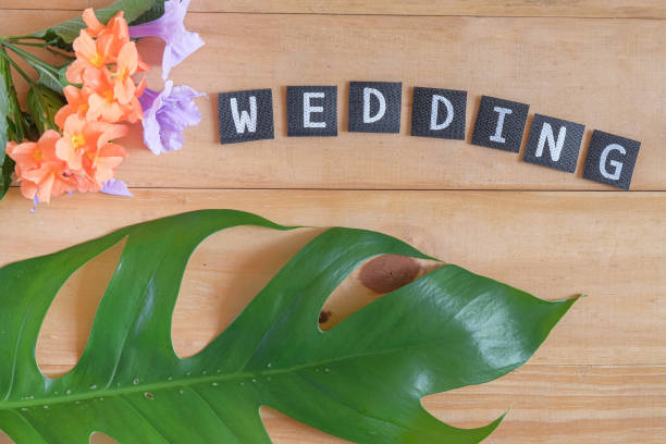 istock Wedding text on wood table , love concept. 1438675164