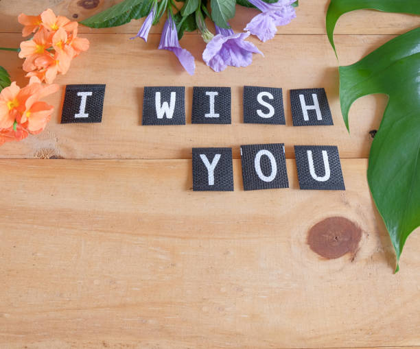 istock I Wish You text on tag over wood table. 1438675199