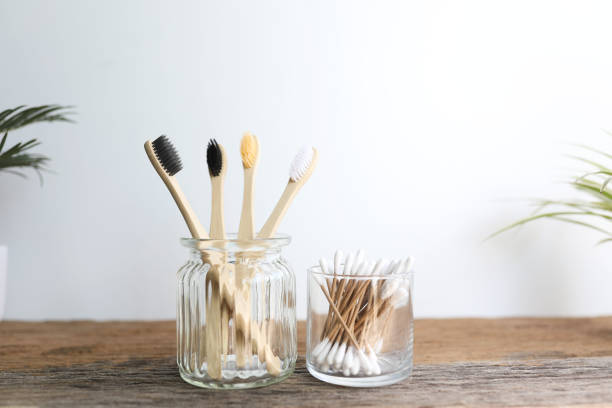 istock Bamboo toothbrush eco friendly materials and unbleached paper cotton swabs 1438675800