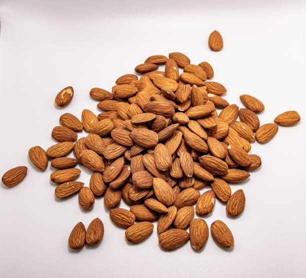 istock Closeup shot of almonds in a bunch 1438676015