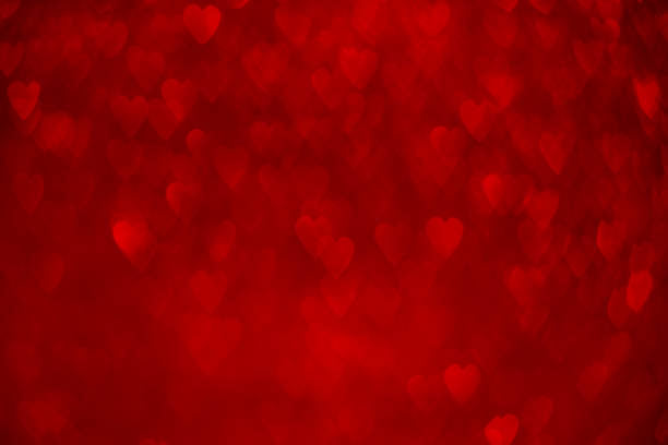 rojo corazones fondo bokeh - tarjeta del día de san valentín fotografías e imágenes de stock