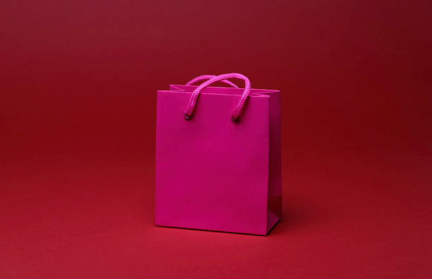 paper gift bag on the red background