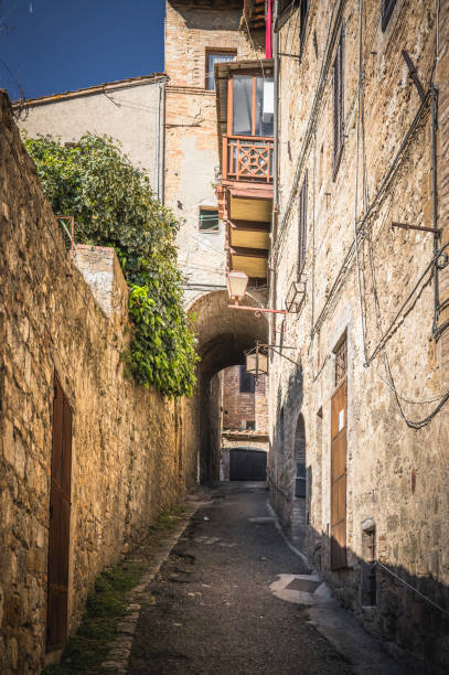 istock old stone town street at morning 1438682566
