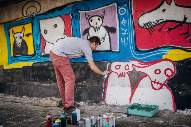 istock Male artist painting graffiti 1438686807