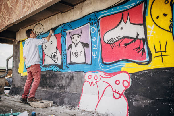 istock Male artist painting graffiti 1438686876