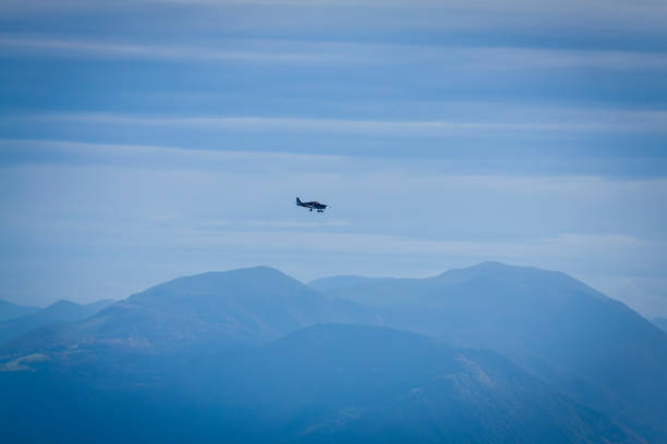 istock Le Sappey en Chartreuse 10 2022 small plane flying past the misty mountains 1438687132