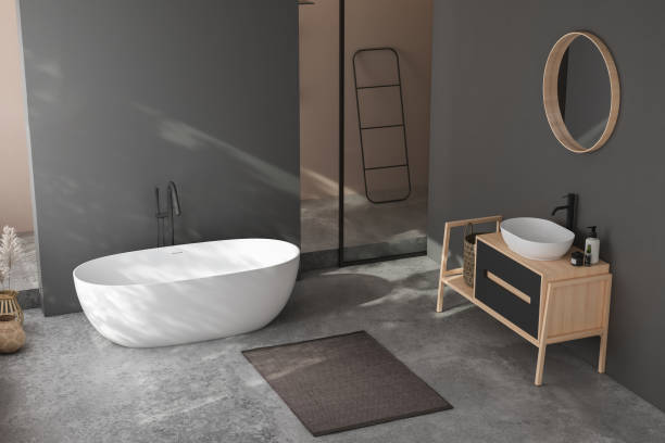 istock Modern minimalist bathroom interior, modern bathroom cabinet, white sink, wooden vanity, interior plants, bathroom accessories, bathtub and shower, black and beige walls, concrete floor. 3d rendering 1438687493