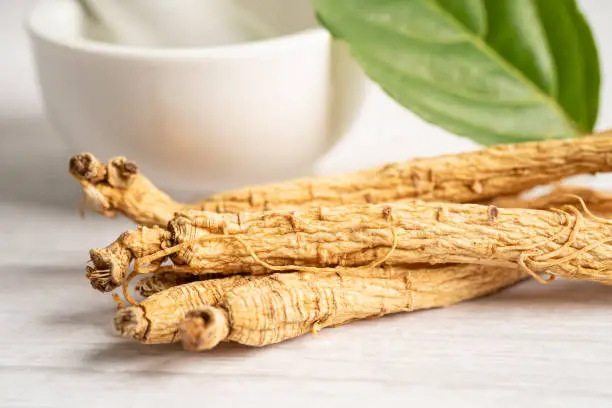Photo of Ginseng, dried vegetable herb. Healthy food famous export food in Korea country.