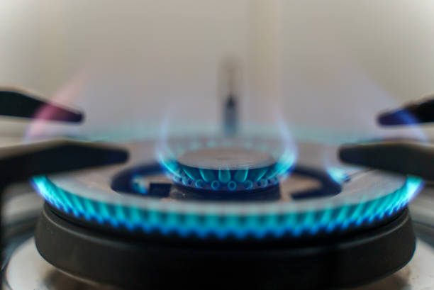 istock Kitchen stove with blue flames burning 1438692052