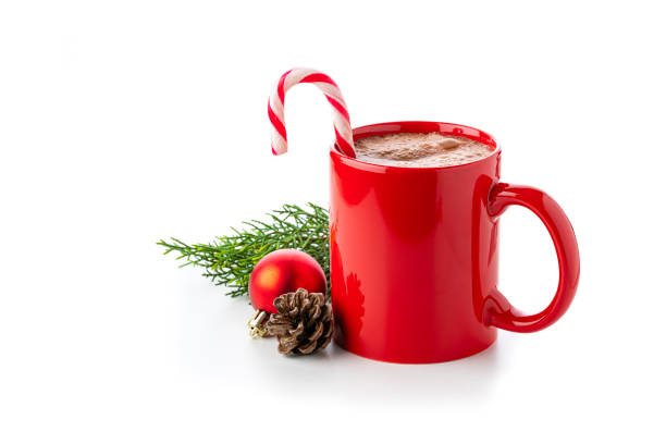 istock Hot chocolate mug with candy cane on white background 1438702206