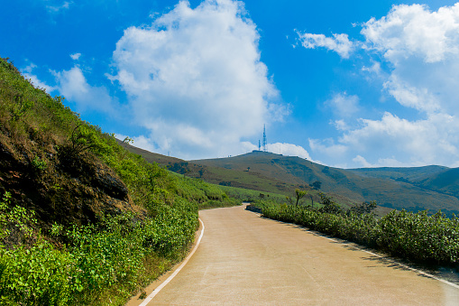 Meandering road passing through beautiful hill station of chikmagalur.