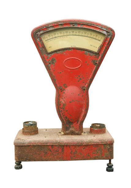 istock Old red mechanical analog retail scales isolated on white. 1438708436