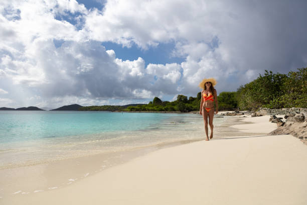 istock Woman  on tropical beach 1438712224