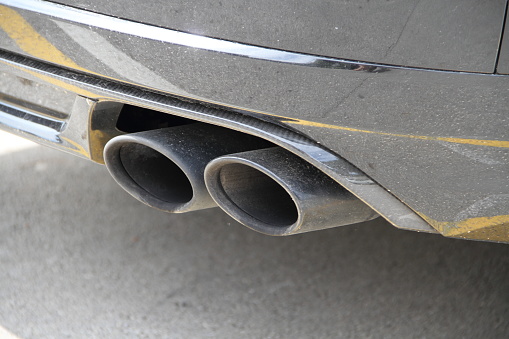 Double exhaust of a black car