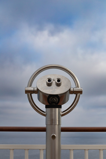 Coin operated binoculars on the Viareggio pier at sunset
