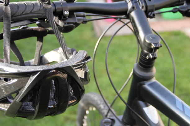 istock a bicycle helmet and a mountain bike 1438714507