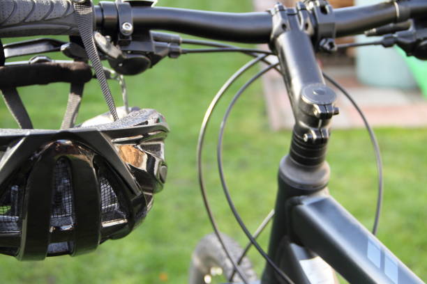 istock a bicycle helmet and a mountain bike 1438714527