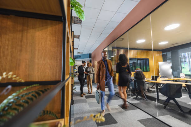 istock Multi-Ethnic People Walking In A Marketing Agency 1438719433