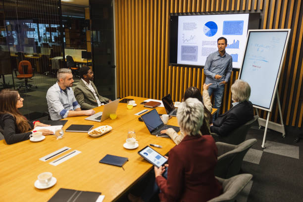 istock Mixed Age Range International Colleagues Working Together On A New Project 1438719652