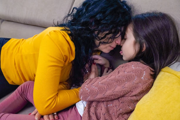 istock Mother and daughter playing at home. 1438719932