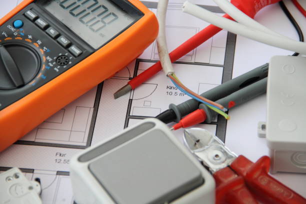 istock Sockets with a screwdriver and a measuring device on a circuit diagram 1438722069