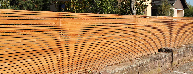 a beautiful garden fence made of wood