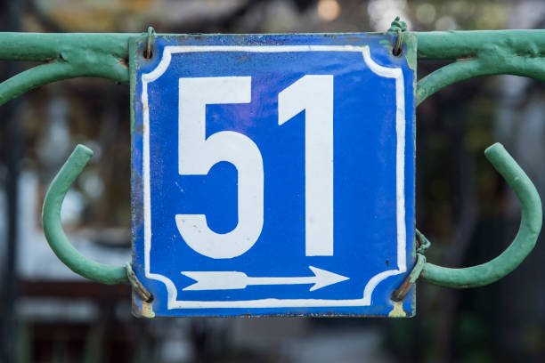 istock Weathered enameled plate number 51 1438724237