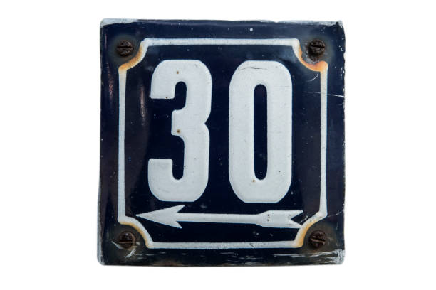 istock Weathered enameled plate number 30 1438724337