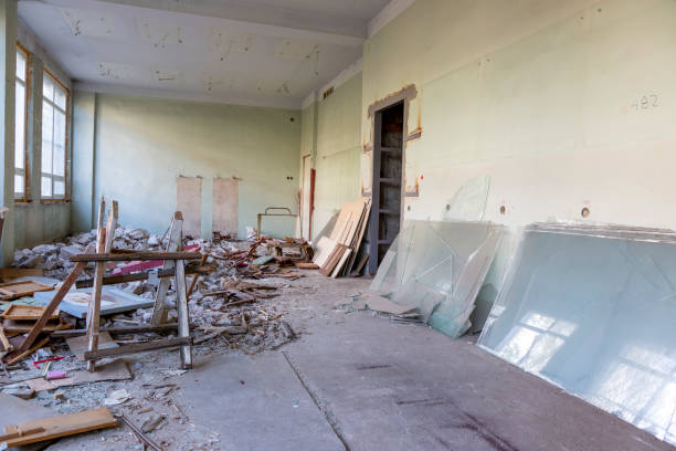 istock Broken floor, trash and clutter in an abandoned room 1438724844