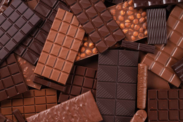 istock Assorted chocolate bar. Dark and milk chocolate background. 1438725812