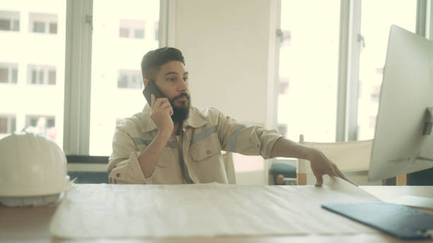istock Dissatisfied, the head engineer called his subordinates. 1438729153