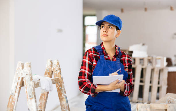 istock Woman engineer matching check list during repair works 1438731354